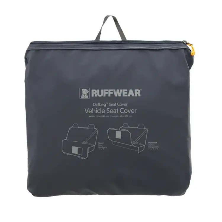 Close-up of a Dog Seat Cover in its carrying bag. The dark bag, featuring a handle, displays installation illustrations and white text describing dimensions and features.