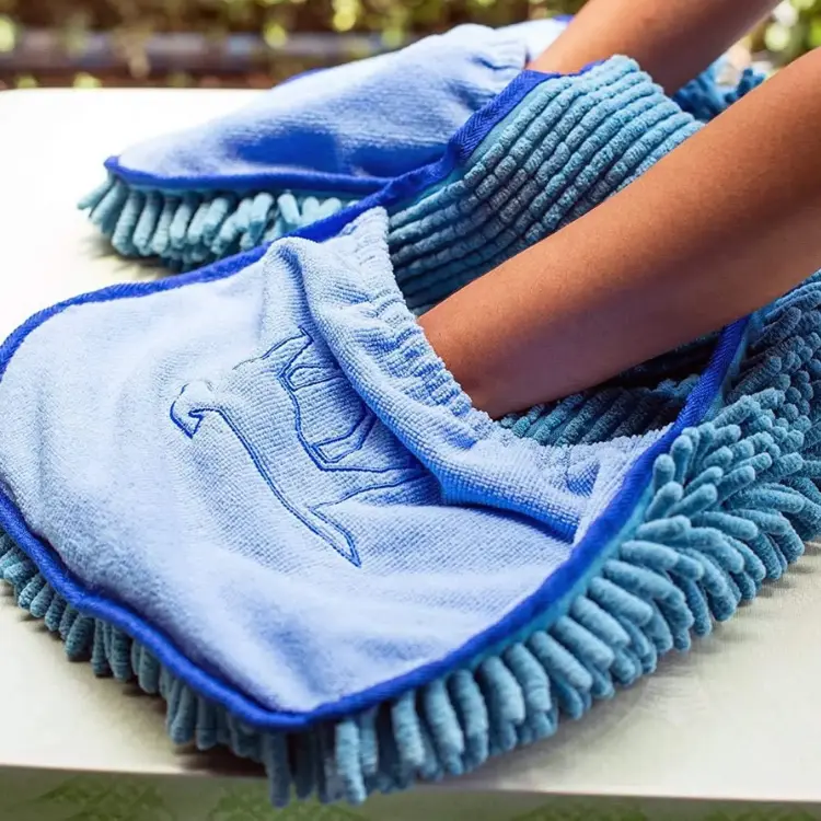 lose-up of blue microfiber dog drying mitt gloves with hand pockets, ideal for grooming, paw cleaning, and quickly drying wet fur