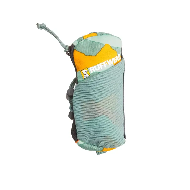 Lightweight, portable dog poop bag dispenser stored in a small stuff sack for convenient travel and outdoor adventures.
